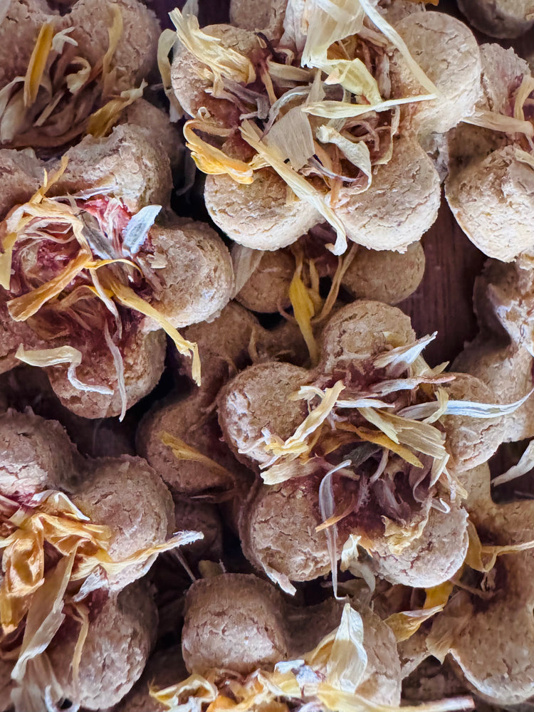 A close up of BunBun & Co. Strawberry Carrot Blossom rabbit treats.