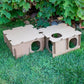 Two assembled Mini Haven cardboard rabbit hide playhouses displayed on grass