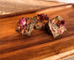 Botanical forage bars for small pets styled on neutral linen with natural wood board and dried floral ingredients