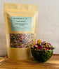 Bunbun & Co. Calm Blend rabbit forage package with a bowl of forage on a wooden surface.