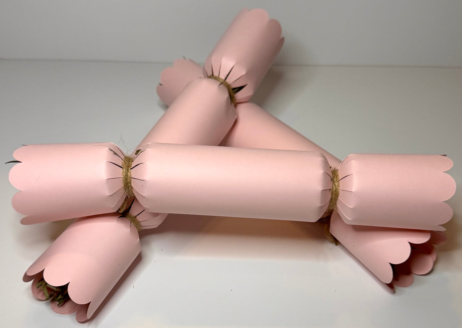 Three Pink Bunny safe Valentine BonBons sitting on a white background