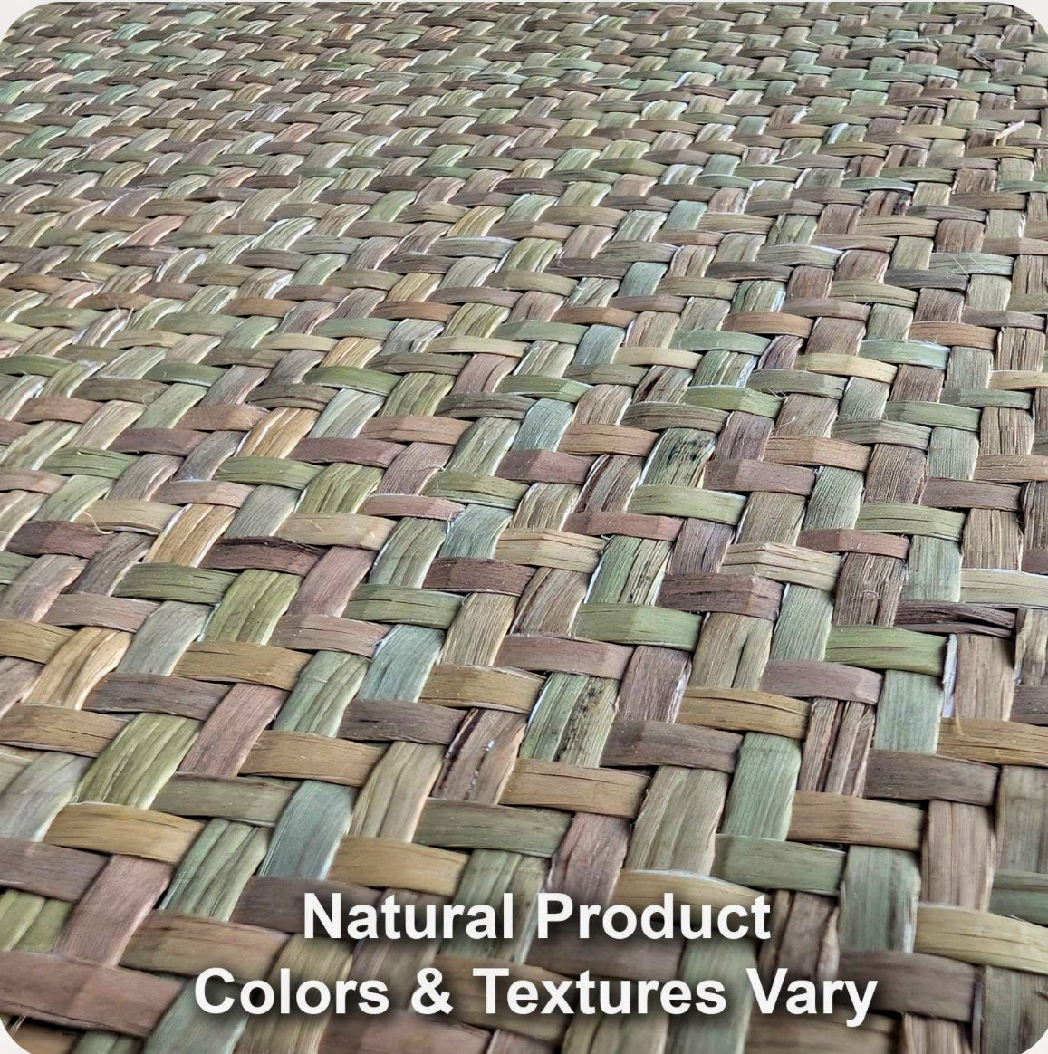 Close view of woven natural seagrass mat texture showing color and weave variation