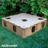 Large Maze Haven cardboard rabbit hide and enrichment maze assembled on grass with foliage background